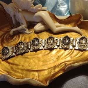 Siam silver~gold~black bracelet~it has 1 boo boo on back which is pictur…